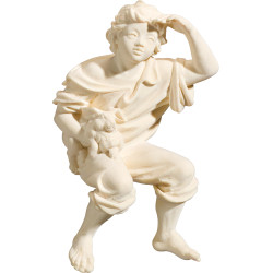 Pastor sentado con conejo